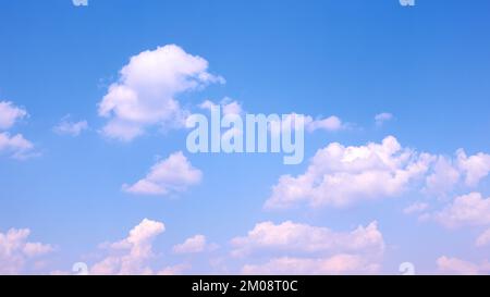 Deep blue sky with cumulus clouds - background Stock Photo