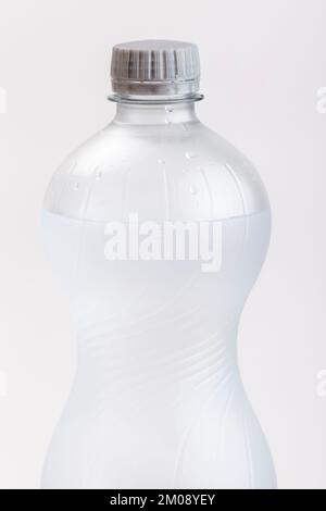A full plastic bottle of water on a white background Stock Photo