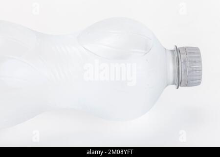 A full plastic bottle of water on a white background Stock Photo