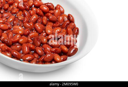 Red kidney beans in a dish in perspective isolated on white background. with clipping path Stock Photo