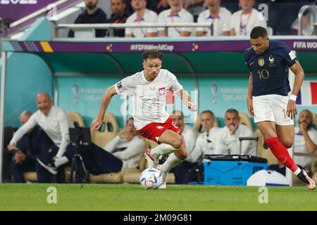 Doha, Qatar. 4th Dec, 2022. Matty Cash (POL) Football/Soccer : FIFA World Cup 2022 Round of 16 match between France 3-1 Poland at the Al Thumama Stadium in Doha, Qatar . Credit: Mutsu Kawamori/AFLO/Alamy Live News Stock Photo