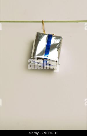 Christmas gift is isolated on grey background Stock Photo