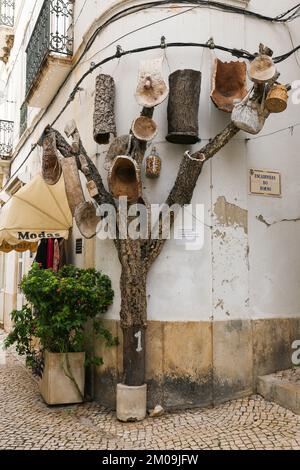 Alcacer do Sal, Setubal, Portugal- October 28, 2022: Decorative tree made of cork on the street in Portugal Stock Photo