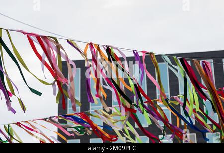 Multi-colored festive ribbons. abstract multicolored backdrop. Stock Photo