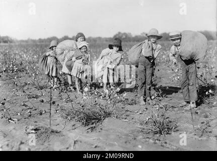 AMERICAN CHILD LABOUR IN A COTTON SPINNING MILL photographed by Lewis ...