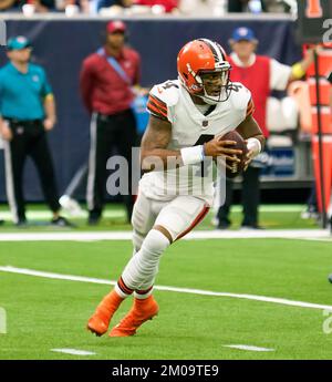 Cleveland Browns DESHAUN WATSON (4) escapes Houston Texans defenders during  the game between the Cleveland Browns and the Houston Texans in Houston,  Texas at NRG Stadium on December 4, 2022. The Cleveland