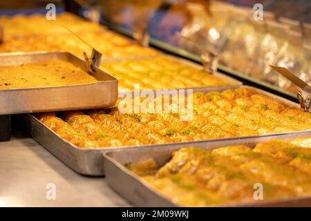 Baklava varieties. Varieties of baklava on display at the patisserie counter Stock Photo