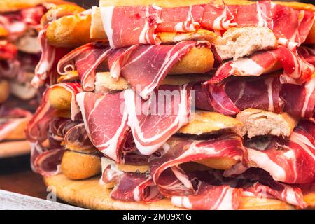 delicious salami with slices of cheese Stock Photo