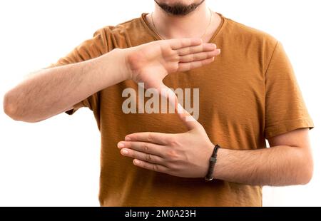 Man learns sign language to speak. Hand gestures of deaf people. Stock Photo