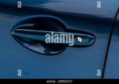 Car door handle. Keyless entry car door handle with touch sensor. Access button. Stock Photo