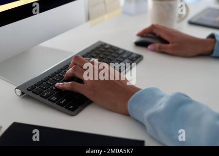 Hands of female programmer working on computer, testing code of new app Stock Photo