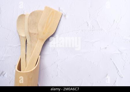 wooden cutlery fork and spoon on white background  Stock Photo