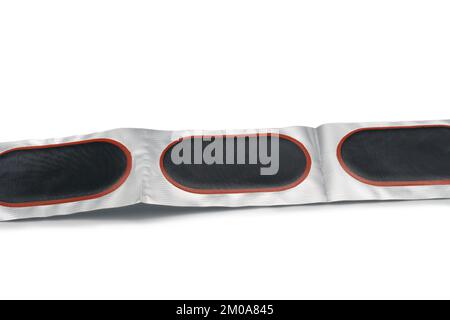 Puncture patches for bike. Close-up. On white background. Stock Photo