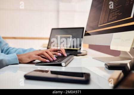 Closeup image of engineer debugging and upgrading software Stock Photo
