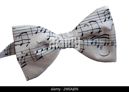 White bow tie with musical notes on set on white background Stock Photo