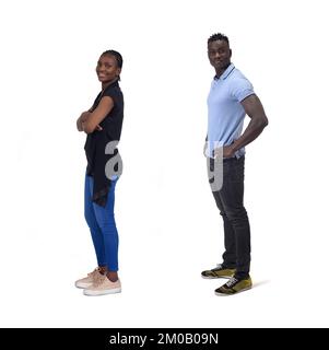 side view of a couple standing over white background Stock Photo