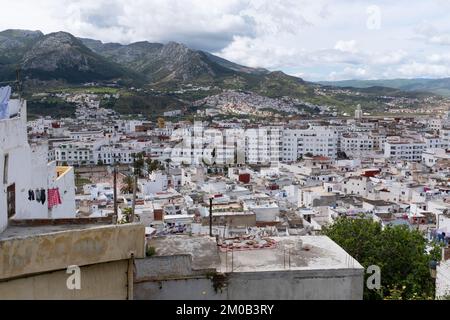 Tetouan, Morocco - April 19, 2019: The old city of Tetouan is an oasis of tranquility and beauty, with its narrow cobbled streets and its white Andalu Stock Photo