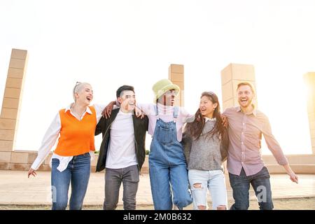 Slow motion close up of group of young friends of different ethnicities are having fun together Stock Photo