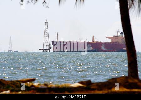 Cabimas-Zulia-Venezuela-29-11-2007- An oil tanker is towed to Pdvsa port in Salina on Lake Maracaibo. © JOSE ISAAC BULA URRUTIA Stock Photo