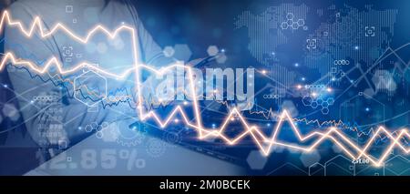 Businessman with computer analyzing business graphs, finances and economic data of the stock market. Mixed Media Stock Photo