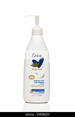 IRVINE, CALIFORNIA - 4 DEC 2022: A bottle of Dove Body Love Lotion, Intense Care Soin Intense Lotion. Stock Photo