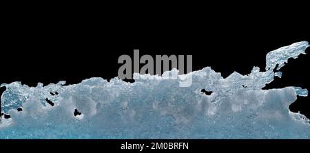icy blue snow and ice on a black background Stock Photo