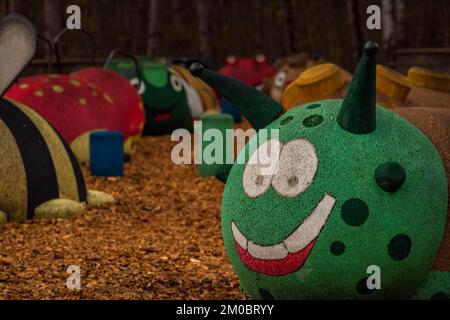 Climbing frame in zoo garden with big color insect Stock Photo