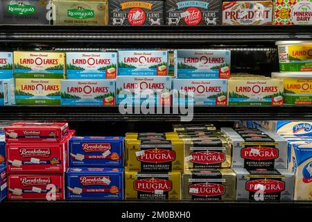 Containers of milk in a supermarket refrigerator in New York Stock Photo -  Alamy