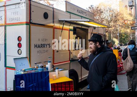 A branded truck promoting HarryÕs grooming supplies outside of Washington Square park in New York on Friday, December 2, 2022. The Òhonestly pricedÓ razor and other grooming supplies manufacturer and retailer gave away hot chocolate, coffee and cookies as a brand promotion. (© Richard B. Levine) Stock Photo