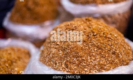 Tobacco leaves waiting to be sold for rolling cigarettes, tobacco sold in sacks, with space, with text space Stock Photo