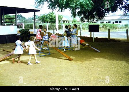 Children in the playground at the RAF Primary School on Burma Camp, Accra, Ghana, c.1959 Stock Photo