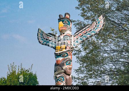 Vancouver, Canada - September 11, 2022: Totem pole in Staley Park is one of many First Nations totem pole on display at the park. Stock Photo