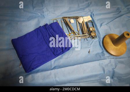 some instruments for a dental operation are lying on the operating table Stock Photo