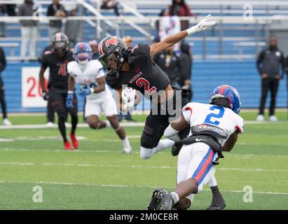 Georgetown Texas USA, December 3 2022: Receiver gains yards after catching a pass during a University Scholastic League (UIL) quarter-final playoff football game in central Texas. ©Bob Daemmrich Stock Photo