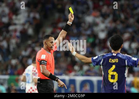 Al Wakrah, Qatar. 05/12/2022, Referee Ismail Elfath shows yellow card during the FIFA World Cup Qatar 2022 Round of 16 match between Japan and Croatia at Al Janoub Stadium on December 5, 2022 in Al Wakrah, Qatar. Photo: Goran Stanzl/PIXSELL Stock Photo