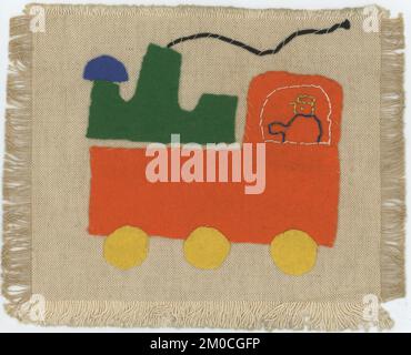 Sewing exercise of an 8 year old girl from 1967. A locomotive made of felt sewn on textile Stock Photo