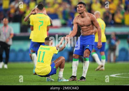 Doha, Qatar. Dec 5, 202Carlos Henrique Casemiro with Raphael Dias Belloli Raphinha of Brazil during the FIFA World Cup Qatar 2022 match, round of 16, between Brazil and South Korea played at  Stadium 974 on Dec 5, 2022 in Doha, Qatar. (Photo by Bagu Blanco / PRESSIN) Stock Photo
