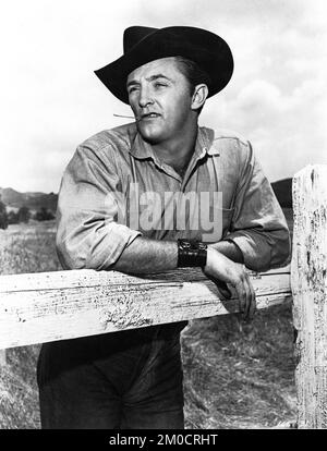 ROBERT MITCHUM candid portrait in THE RED PONY 1949 director LEWIS MILESTONE novel and screenplay John Steinbeck Charles K. Feldman Group Productions Inc. / Lewis Milestone Productions / Republic Pictures Stock Photo