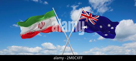 two crossed flags Australia and Iran waving in wind at cloudy sky. Concept of relationship, dialog, travelling between two countries. 3d illustration Stock Photo