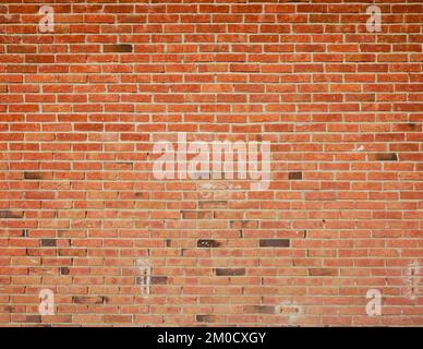 An old grungy red brick wall background Stock Photo