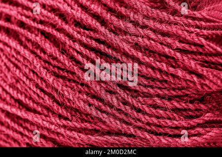 Technical ropes in a roll. Grunge Viva Magenta color texture Stock Photo