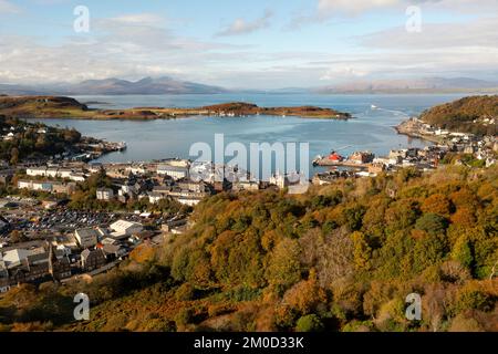 The Scottish town of Oban, sits on Oban Bay which is sheltered by the Isle of Kerrera.  The Isle of Mull can be seen in the background. Stock Photo