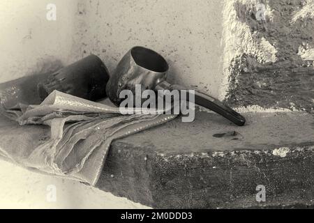 Vintage coffee copper pot and glass, Greece. Stock Photo