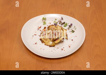 There are simpler ways to cook artichokes, but none as attractive as the one that imitates the shape of a flower Stock Photo