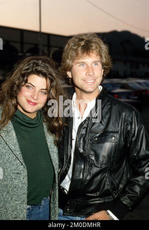 **FILE PHOTO** Kirstie Alley Has Passed Away At 71. Kirstie Alley and Parker Stevenson Circa 1980's Credit: Ralph Dominguez/MediaPunch Stock Photo