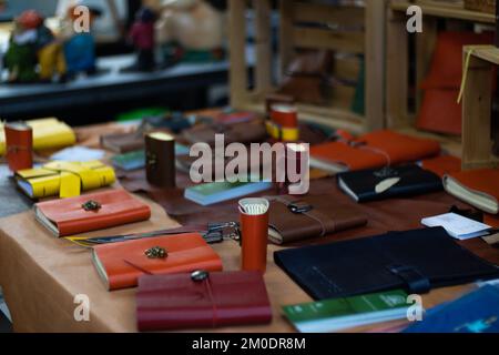 Multi-colored notebooks made of leather. Stock Photo