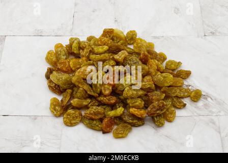 Dried Raisins isolated on clear background. Diet food concept Stock Photo