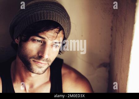 Where should I go from here...Handsome young man looking away and contemplating his future. Stock Photo