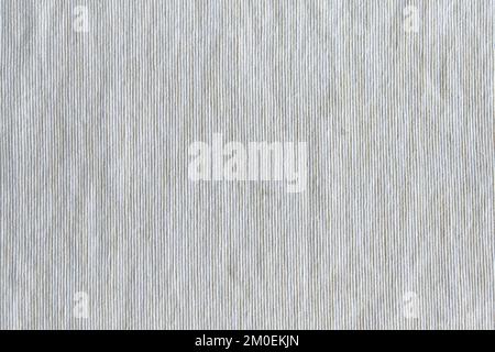 The texture of the light fabric of long strips close-up. Stock Photo