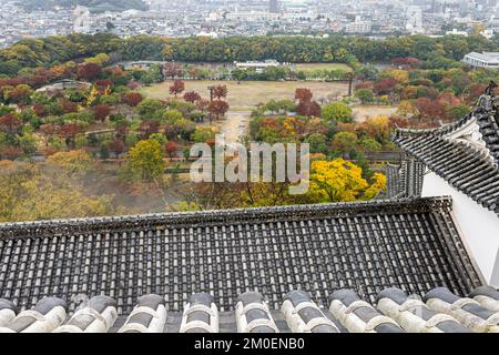 Himeji, Japan. Aerial view of the curved gables and rooftop tiles of the White Egret or Heron Castle, a castle complex from the Azuchi Momoyama period Stock Photo